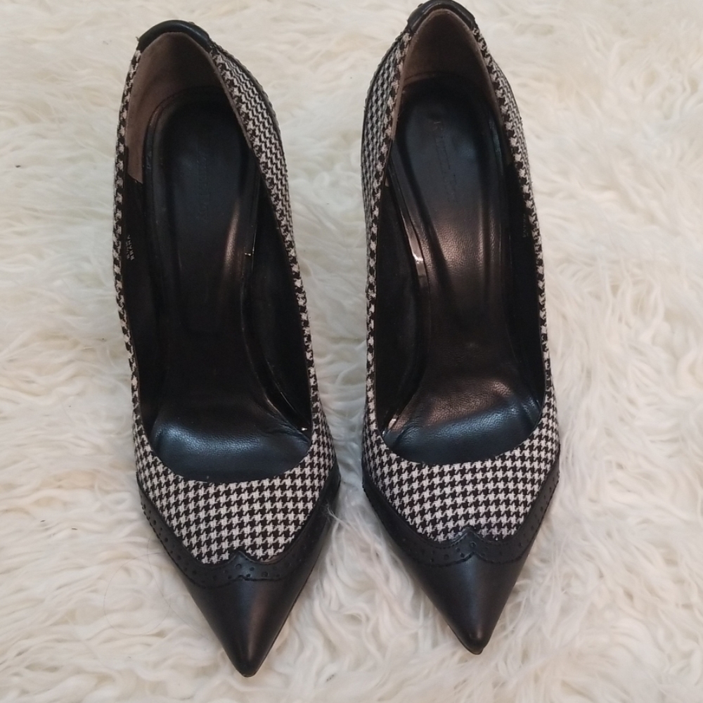 Black and white pumps